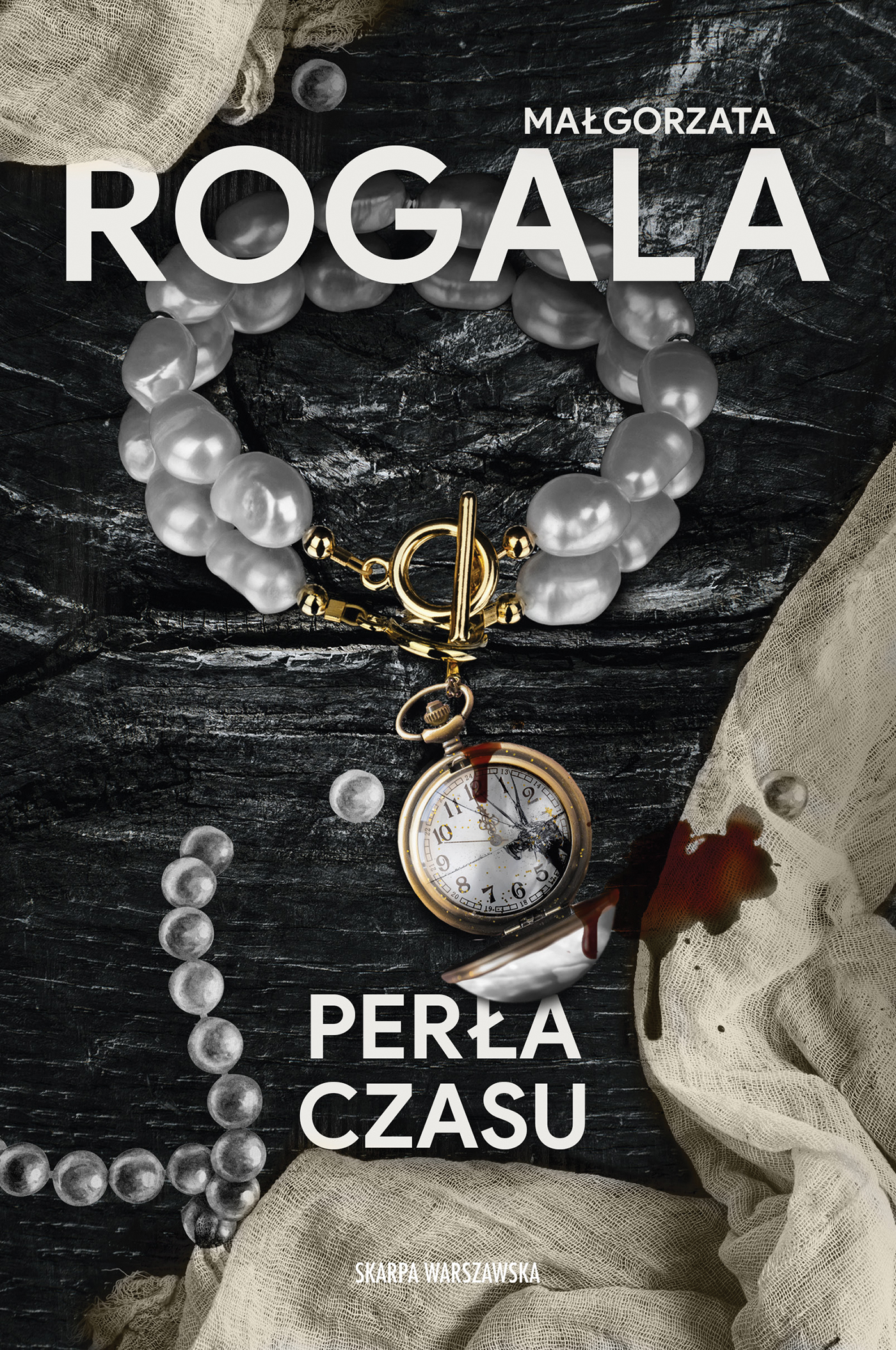 Tytuł: Perła czasu
Autor: Małgorzata Rogala
Wydawnictwo: Skarpa Warszawska
Formaty: EPUB, MOBI
